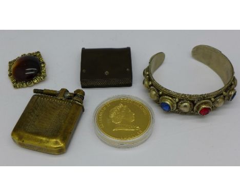 A vesta case, silver bangle, lighter, Cook Islands dollar coin and brooch