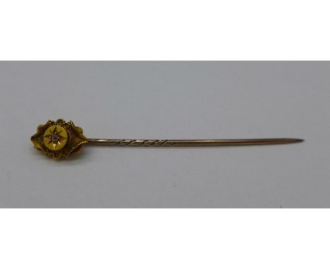 A 15ct gold and diamond stick pin