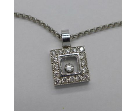 A Chopard 18ct white gold and diamond Happy Diamonds Icons pendant, the square pendant set with seventeen diamonds, on an 18c