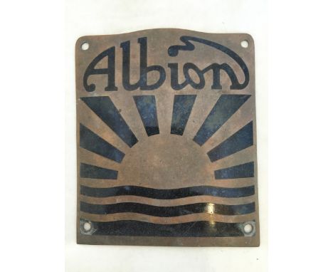 An Albion radiator plaque with partial black enamel.