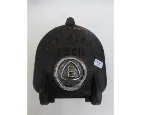 A "Push Stop" button, removed from the Douglas factory.