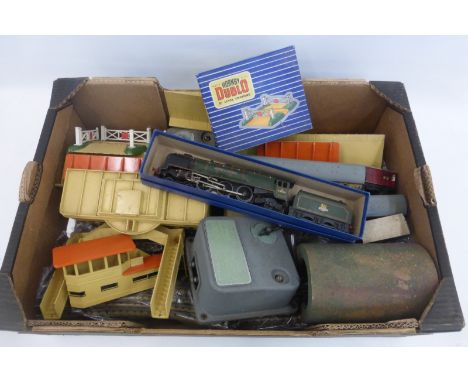 A box of assorted Hornby Dublo, including a platform, raised platform crossing bridge, D1 level crossing, carriages and rolli