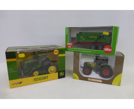 Three boxed farmyard die-cast models including a UH Claas 936 tractor, a Britains John Deere 9560 track tractor and a Siku Ba