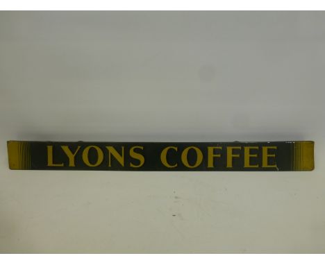 A Lyons Coffee shelf strip, originally from Castle Combe Post Office, 19 3/4 x 1 3/4".