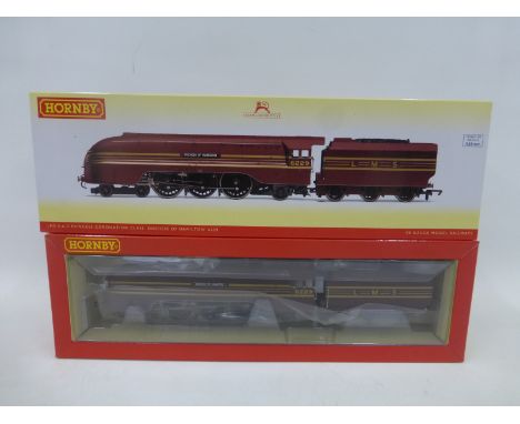 A Hornby L.M.S. 4-6-2 Princess Coronation class "Duchess of Hamilton" 6229 engine and tender, boxed and in mint condition.