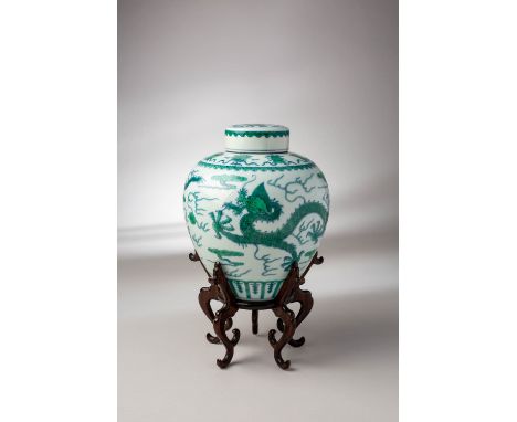 A FINE CHINESE IMPERIAL GREEN-ENAMELLED 'DRAGON' JAR AND COVER SIX CHARACTER QIANLONG MARK AND OF THE PERIOD 1736-95 The glob