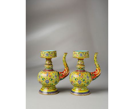 AN EXCEPTIONAL AND RARE PAIR OF CHINESE IMPERIAL YELLOW-GROUND TIBETAN STYLE EWERS, PENBA HU SIX CHARACTER JIAQING MARKS AND 