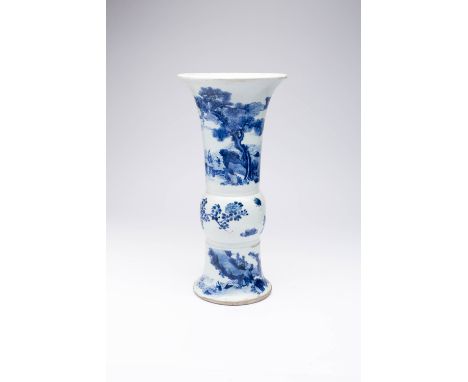 A CHINESE BLUE AND WHITE 'LANDSCAPE' BEAKER VASE, GU KANGXI 1622-1722 The upper and lower sections painted with a continuous 