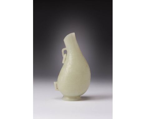 A CHINESE PALE CELADON JADE PEAR-SHAPED VESSEL 18TH/19TH CENTURY Raised on a splayed foot, decorated with bands of geometric 