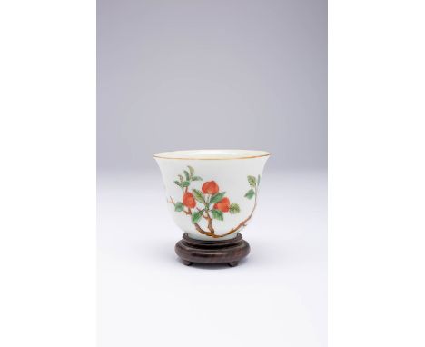 A RARE CHINESE 'LANTERN FLOWERS' CUP DAOGUANG 1821-50 The bell shaped bowl painted with a leafy branch with seven lantern flo