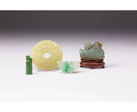 A CHINESE YELLOW JADE BI, A JADE MANDARIN DUCK AND TWO JADEITE ITEMS QING DYNASTY The bi carved with the zodiac animals and t