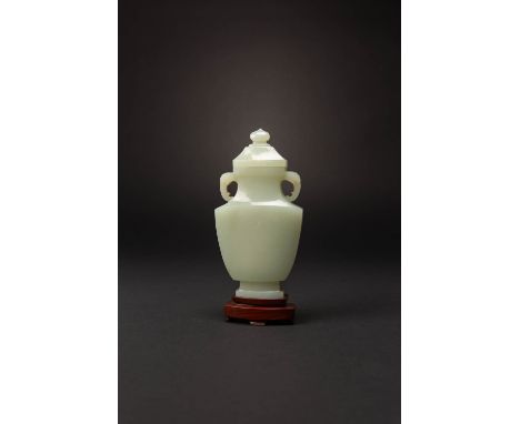 A CHINESE PALE CELADON JADE RECTANGULAR-SECTION VASE AND COVER, PING QIANLONG/JIAQING The translucent pale green stone elegan