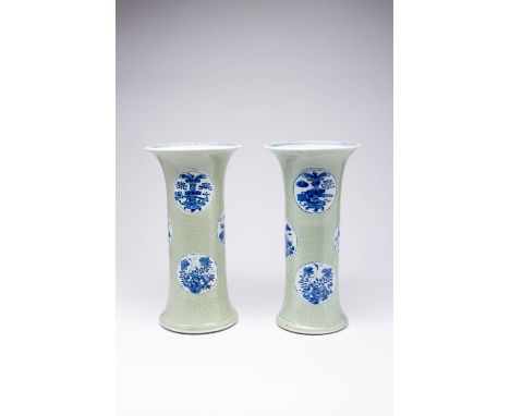 A LARGE PAIR OF CHINESE CELADON-GROUND BEAKER VASES, GU KANGXI 1662-1722 Each painted with six medallions of flowers and prec