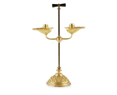 BENHAM &amp; FROUD, LONDONAESTHETIC MOVEMENT GILT METAL DESK CANDELABRA, CIRCA 1880 the square column with ebonised handle su