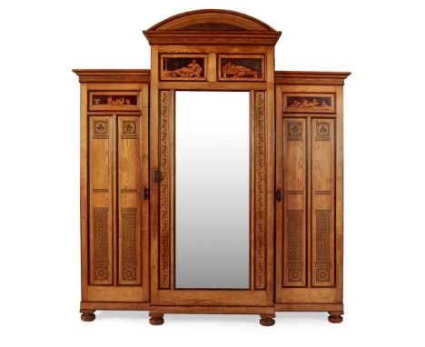 ATTRIBUTED TO HENRY WILLIAM BATLEY (1846-1932) AND GILLOW &amp; CO.AESTHETIC MOVEMENT ASH WARDROBE, CIRCA 1870 with arched ar