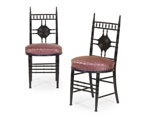 COLLINSON &amp; LOCK, LONDONPAIR OF AESTHETIC MOVEMENT EBONISED SIDE CHAIRS, CIRCA 1880 each with turned reeded uprights encl