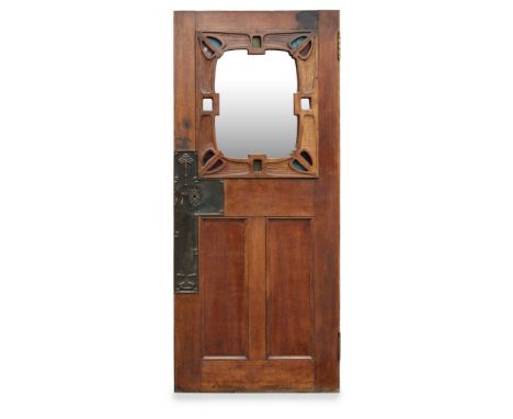 GLASGOW SCHOOL, ATTRIBUTED TO JOHN NISBET (1868-1951)ART NOUVEAU OAK DOOR, CIRCA 1900 with later central clear glass panel en