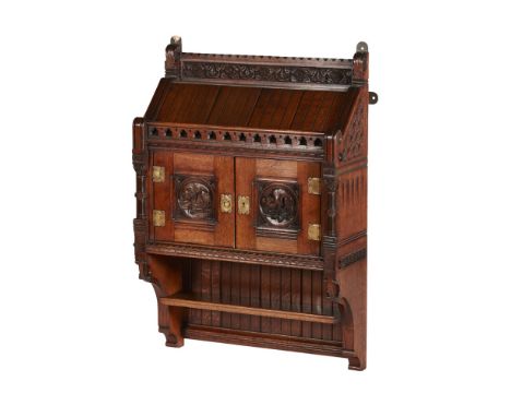 BRUCE JAMES TALBERT (1838-1881) FOR HOLLAND &amp; SONRARE GOTHIC REVIVAL OAK WALL CABINET, CIRCA 1867 the galleried top with 