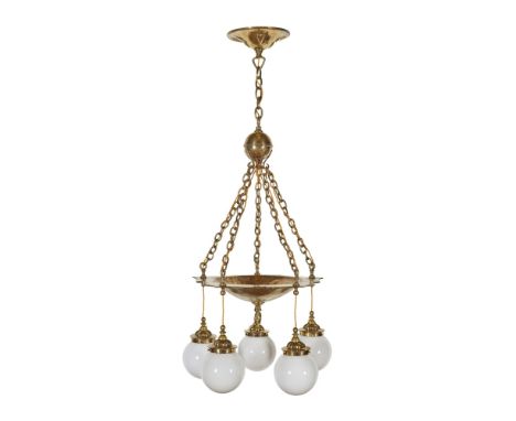 MANNER OF C.F.A. VOYSEYARTS &amp; CRAFTS BRASS FIVE-LIGHT CHANDELIER, CIRCA 1900 the shaped ceiling rose with repoussé heart-