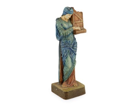 COMPTON POTTERS’ ART GUILDPOTTERY FIGURE OF ST. CECILIA, CIRCA 1920 painted in tempera25.5cm highNote: The Compton Potters' A
