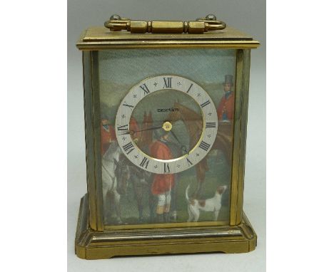 A brass three glass Acctim carriage clock decorated with an 18th Century hunting scene, battery operated, height of case 11cm
