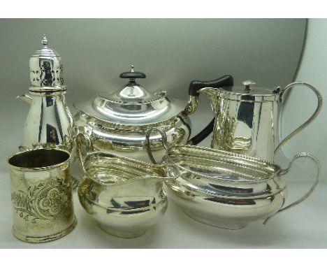 A three piece plated tea service, a shaker, a water jug and a mug