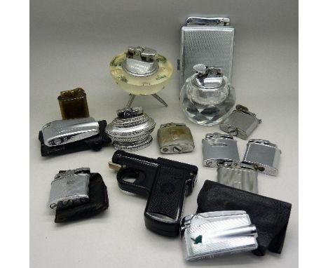 A collection of fourteen lighters including three table lighters and a novelty Razzia lighter in the form of a gun