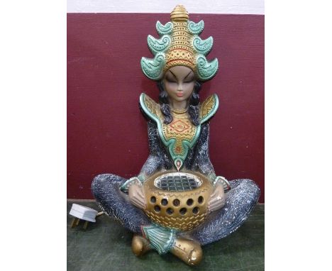 A 1960's table lamp in the form of a Far Eastern deity, restored