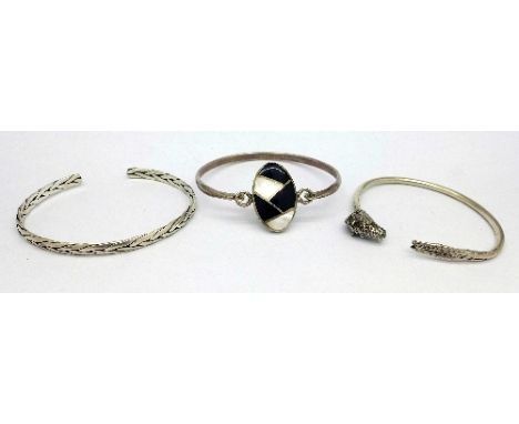 A hallmarked silver bangle and two .925 silver bangles, weight 42g