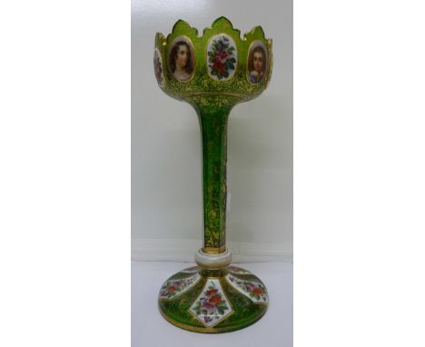 A continental green glass and gilt lustre with hand painted portrait plaques and flowers, height 31.5cm
