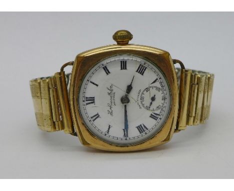 A 9ct gold cushion shaped Thomas Russell & Sons wristwatch