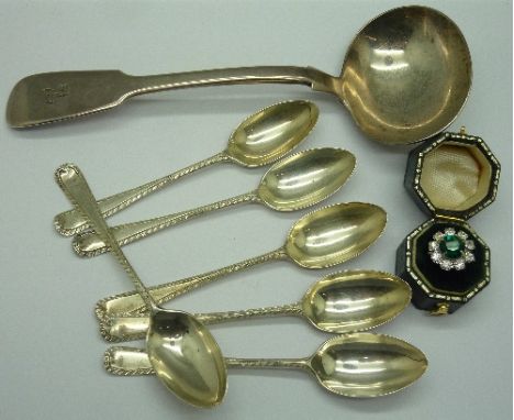 A Victorian silver ladle, London 1845, six silver coffee spoons and a Sarah Coventry cluster ring, weight of silver 126g