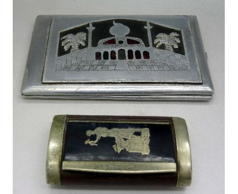 A snuff box and a prisoner of war cigarette case with map of Africa on the reverse