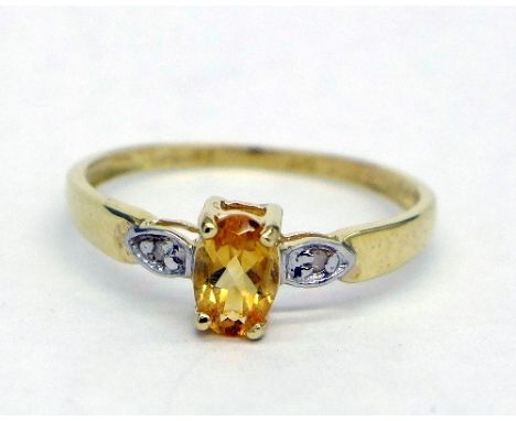 A 9ct gold, citrine and diamond ring, weight 1g, size O