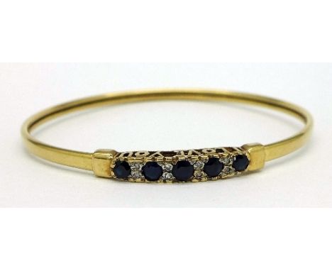 A 9ct gold, sapphire and diamond bangle, weight 6.2g