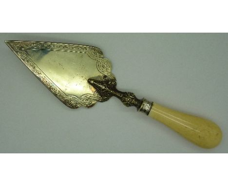 A Victorian ceremonial topping-out trowel with heavy ivory handle, ferrule hallmarked Sheffield 1900