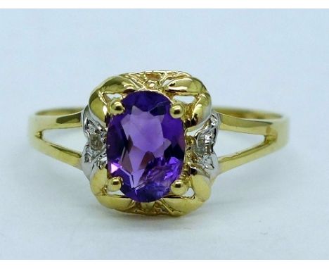 A 9ct gold, amethyst and diamond ring, weight 1.1g, size P