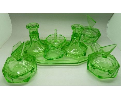 An Art Deco uranium glass dressing table set