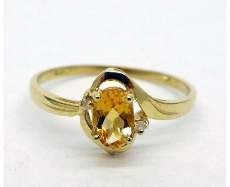 A 9ct gold, citrine and diamond ring, weight 1.1g, size P