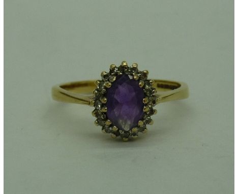 A 9ct gold, diamond and amethyst ring, weight 2.1g, size N