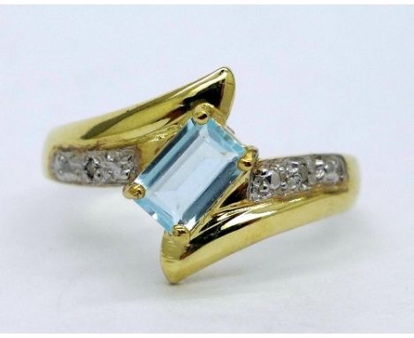 A 9ct gold, blue stone and diamond ring, weight 1.3g, size O