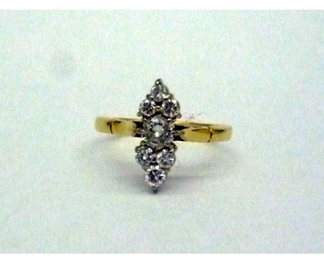 An 18ct gold navette shaped seven stone diamond cluster ring, approximate diamond weight 0.5 carat, weight 3.4g, size O