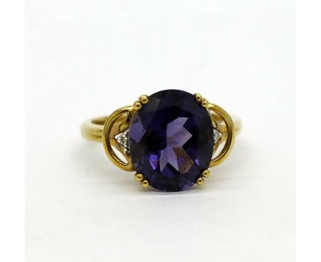A 9ct gold, amethyst and diamond ring, weight 3.4g, size Q