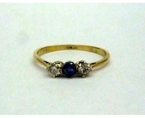 An 18ct gold and platinum set ring with two diamonds and sapphire, weight 1.6g, size S