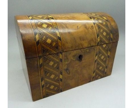 A walnut inlaid dome top caddy, lacking one inner lid, width 20cm