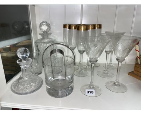 HALF A SHELF OF GLASSWARE, INCLUDING ITALIAN MADE GOLD RIMMED GREEK KEY CHAMPAGNE FLUTES, DANISH ICE BUCKET AND TONGS, DECANT