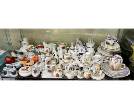 SHELF OF CRESTED CHINA WARES AND LATE VICTORIAN/ EDWARDIAN GERMAN SEASIDE SOUVENIR WARES 