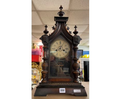 A VICTORIAN WALNUT STEEPLE MANTLE CLOCK