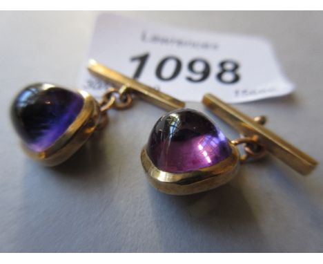 Pair of 9ct gold and cabochon amethyst set cufflinks 