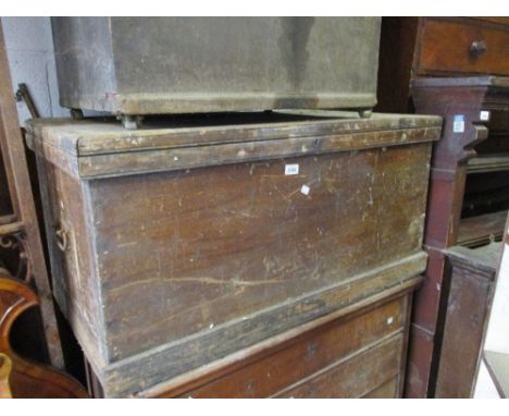 19th Century stained pine tool trunk having hinged cover with iron carrying handles and plinth base (at fault) 